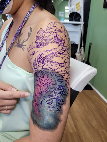 Lucid Dreams Tattoos and Piercings tattoo shop in Anniston, Alabama