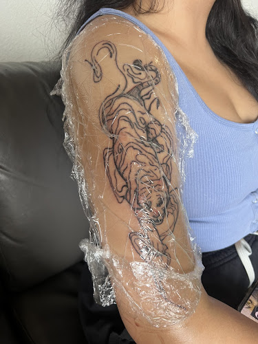 Da Kandy Shop Tattoo Studios WE MOVED DOWN THE STREET tattoo shop in Arlington, Texas