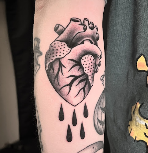 Bird In Hand Tattoo tattoo shop in Auburndale, Massachusetts