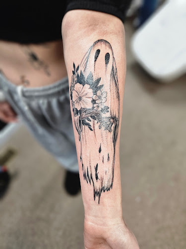 Tucci’s Tattoo & Piercings Studio/Skate shop tattoo shop in Bloomsburg, Pennsylvania