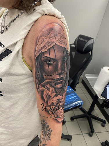 Ink Asylum Tattoo Co. tattoo shop in Burton, Michigan