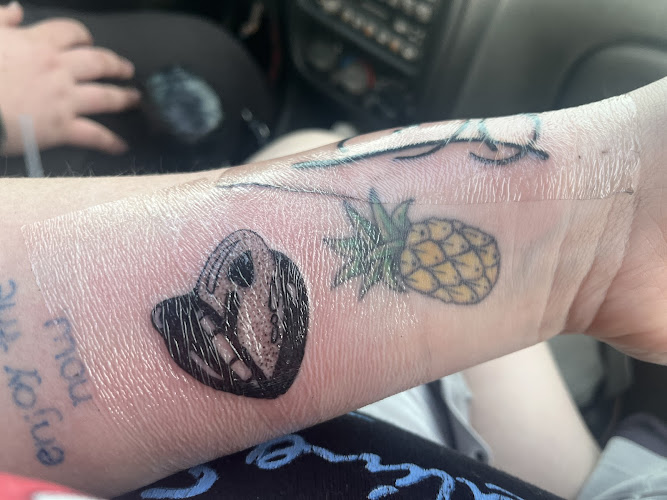 Rainbow Aura Tattoo Boutique tattoo shop in Cedar Rapids, Iowa