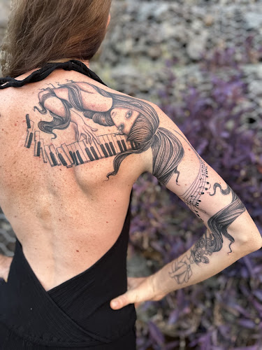 Zx3 Artistry | Tattoo & Beauty Bar tattoo shop in Cocoa Beach, Florida