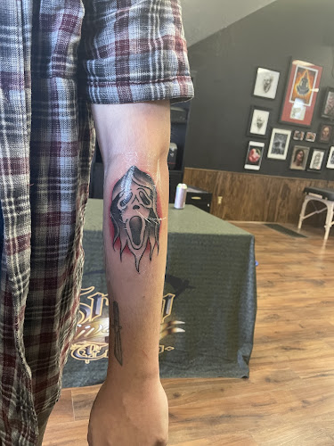 Grim River Tattoo tattoo shop in Dubuque, Iowa