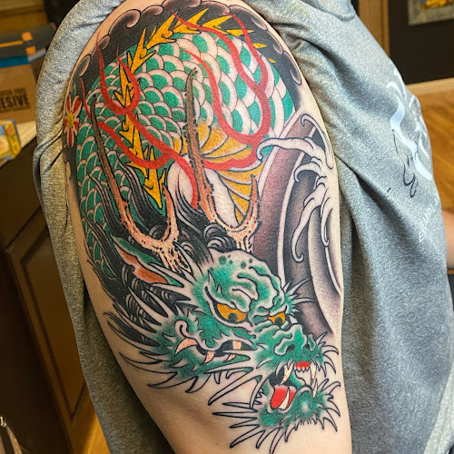 Communion Tattoo Gathering tattoo shop in Dunbar, West Virginia