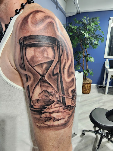 Dusk Till Dawn Tattoo - Piercing & Art Gallery tattoo shop in East Wareham, Massachusetts