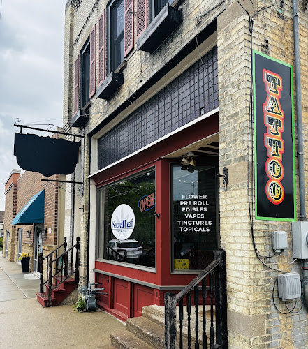 Sacred leaf social club tattoo shop in Edgerton, Wisconsin