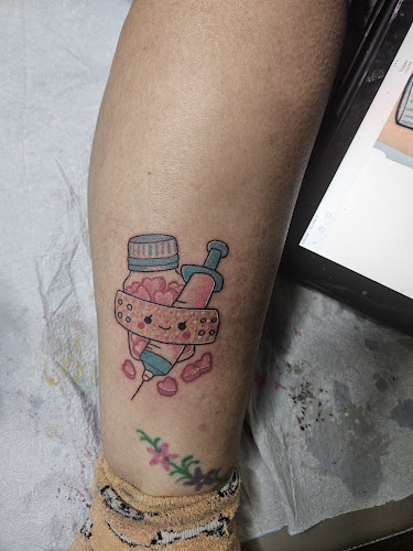 Infiniti Tattoos & Piercings tattoo shop in Elkins, West Virginia