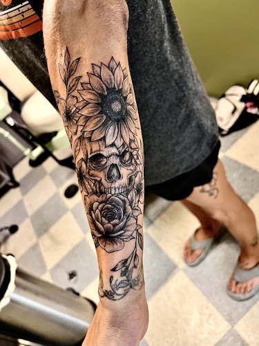 Bluecifers Branded Tattoo tattoo shop in Emporia, Kansas