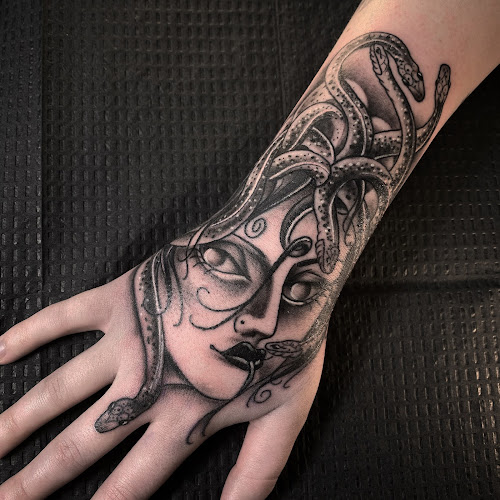 Electric High Five Tattoo Gallery tattoo shop in Enterprise, Alabama