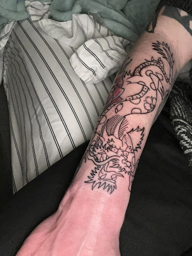 Zion Tattooing & Piercing tattoo shop in Farmington, Minnesota