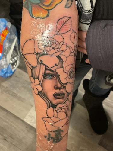 Millennial Ink- Tattoo Shop-Custom Tattoos-Top Tattoo Artist tattoo shop in Flint, Michigan