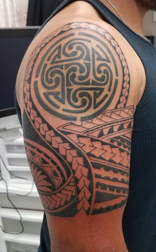 Snakeman's Tattoos, Piercings & Leather tattoo shop in Frederick, Maryland