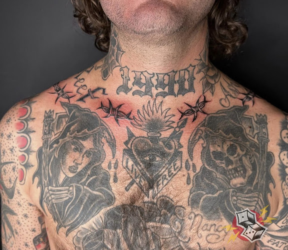 Electric Pair O' Dice Tattoo tattoo shop in Fredericksburg, Virginia