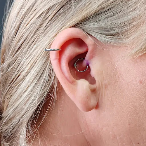 Pretty Pain by Peri tattoo shop in Fredericksburg, Virginia