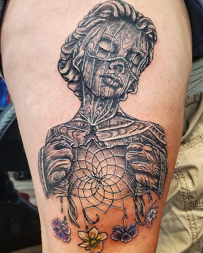 Emerald Buddha Tattoo tattoo shop in Galena, Illinois