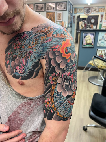 AC/ Revenge Tattoo/ American Craft Art Services LLC tattoo shop in Gloversville, New York