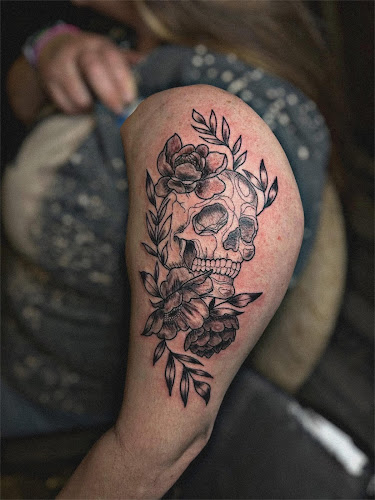 Moth & Flame Tattoo Parlor tattoo shop in Grayson, Kentucky