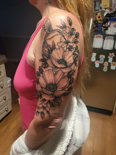 Rooster Tattoo tattoo shop in Greeley, Colorado