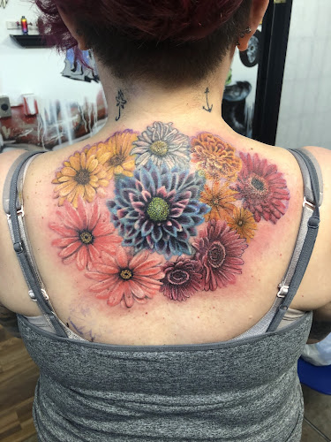 Gallery Fine Art & Tattoo Std tattoo shop in Holt, Michigan