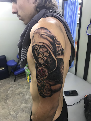 Nemesis in the Hollar tattoo shop in Hurricane, West Virginia