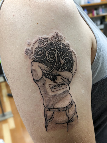 Hypnotic Eye Tattoo tattoo shop in Janesville, Wisconsin