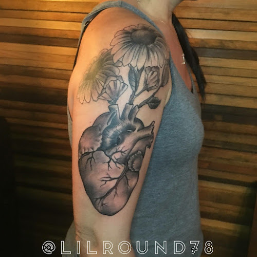 Tattoos by Lil Round tattoo shop in Johns Island, South Carolina