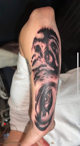 Hamlin Wolcott Tattoos and Piercings tattoo shop in Kankakee, Illinois