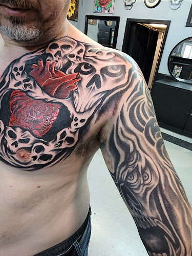 Conspiracy Tattoo tattoo shop in Kent, Ohio