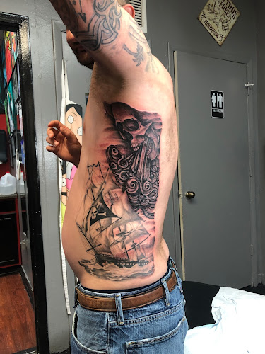 Alchemy Tattoos and Body Piercings tattoo shop in Largo, Florida