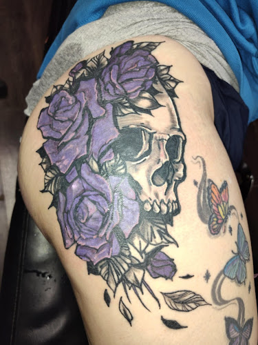 An Evil Angel Social Club Tattoo Parlor tattoo shop in Lima, Ohio