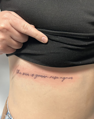 INKED X GREY STREET tattoo shop in Lincoln, Nebraska