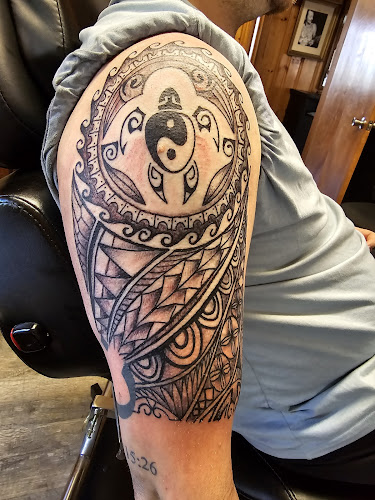 Brass monkey Tattooz tattoo shop in Louisa, Virginia