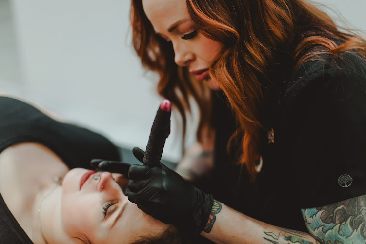 Enamored by Ali tattoo shop in Manhattan, Kansas