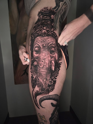 Saged souls tattoo collective tattoo shop in Marion, Iowa