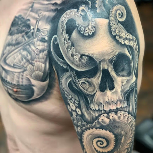 Thirteen Roses Tattoo & Aesthetics tattoo shop in Maryland Heights, Missouri