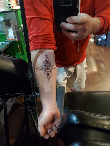 The Creature's Den tattoos, piercing and more tattoo shop in Mattydale, New York