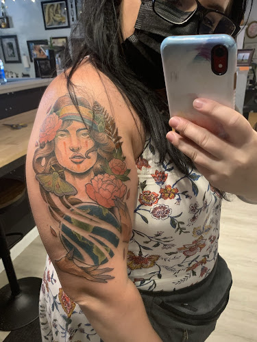 Sacred Feather Tattoo tattoo shop in Monona, Wisconsin