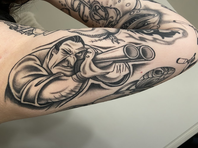 6 Feet Deep Tattoo and Piercings tattoo shop in Monongahela, Pennsylvania