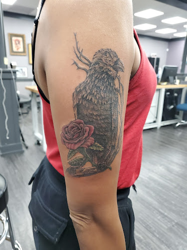 Red Octopus Tattooing tattoo shop in Morningside, Maryland