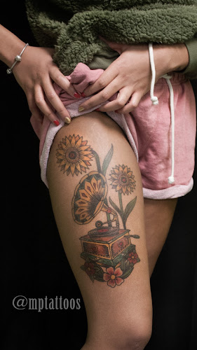 Tattoo Tribe. (English,Spanish & Portuguese) tattoo shop in Newark, New Jersey