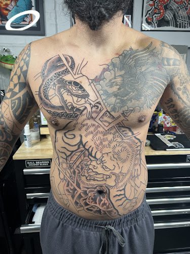 Slow Ride Tattoo & Gallery tattoo shop in Norfolk, Virginia