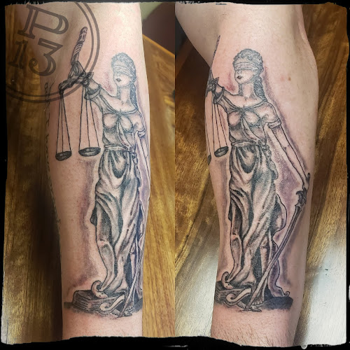 Parlour 13 Custom Tattooing and Artistry tattoo shop in North Henderson, Illinois