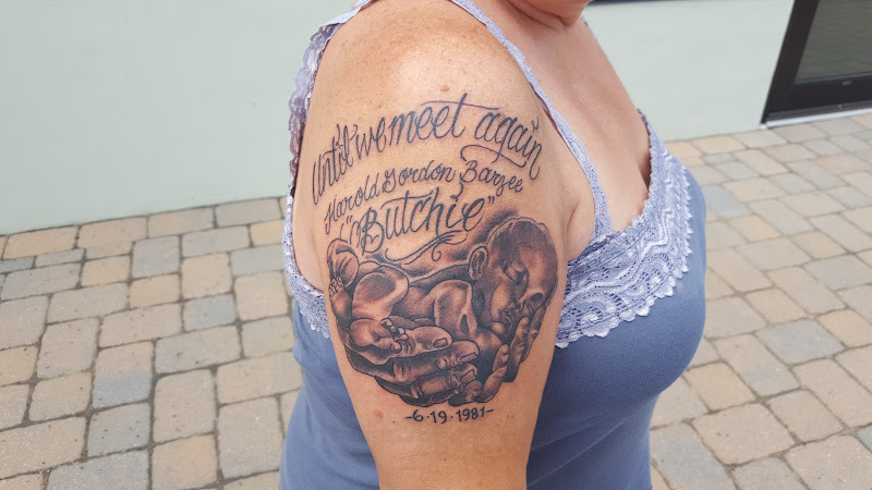 Dawn of Time Tattoo tattoo shop in North Syracuse, New York