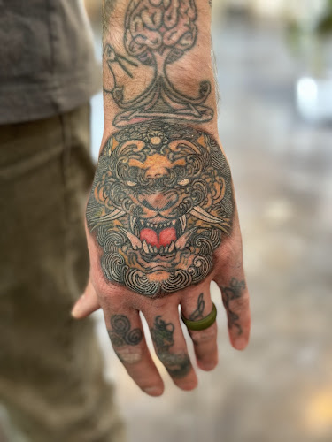 Caffeinated Caterpillar Tattoo Spa tattoo shop in Omaha, Nebraska