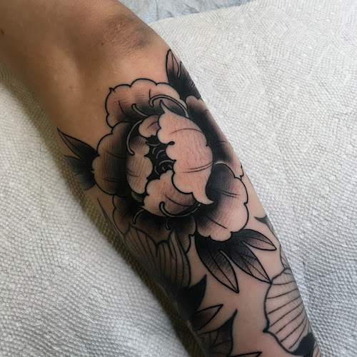 Pops' Tattoo Parlor tattoo shop in Pantego, Texas