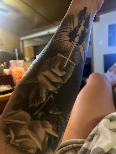 Pain Or Pleasure Tattoo Studio tattoo shop in Pittsburg, Texas