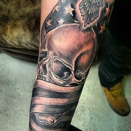 Tattoo Warehouse AND Body Piercings tattoo shop in Plainfield, Illinois