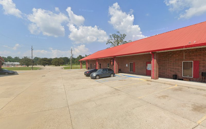 Alley Cats Custom Tattoo and Piercing tattoo shop in Port Allen, Louisiana