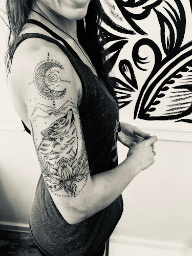 The Eye of Henna & 13 Moons Tattoo Studio tattoo shop in Portland, Maine